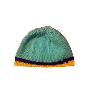 Turquoise crochet beanie with yellow and blue trim